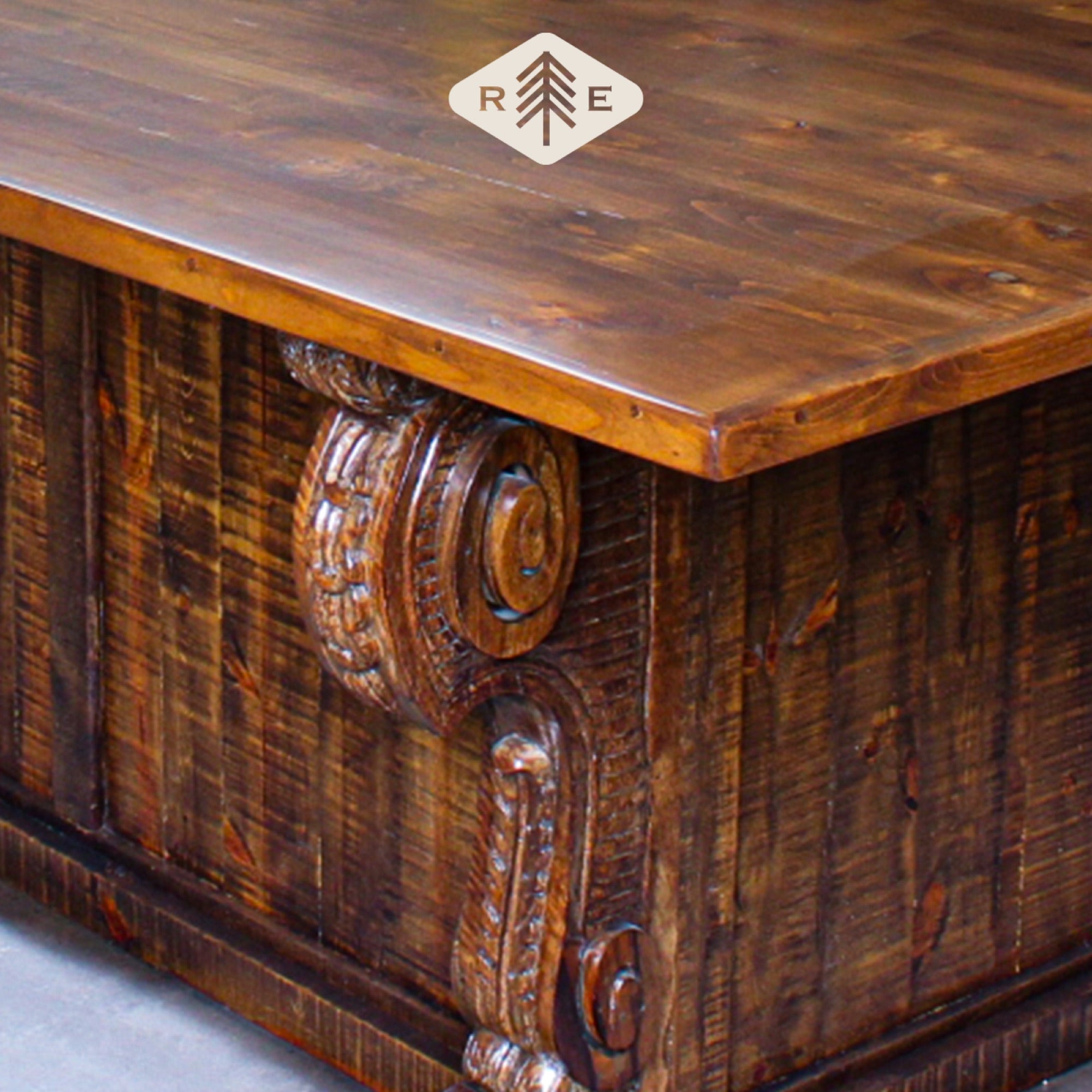 Wooden table corner with intricate carved details